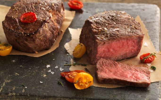 Lemon-Pepper Ribeye Filets with Roasted Tomatoes